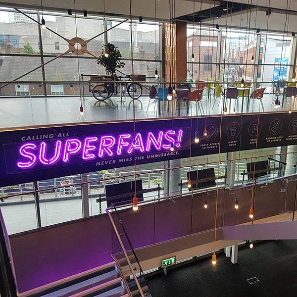NEC superfans logo light