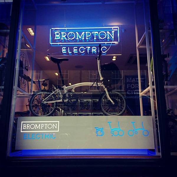 Neon light sign blue Brompton Electric