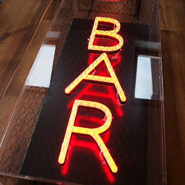 Faux neon light sign red bar