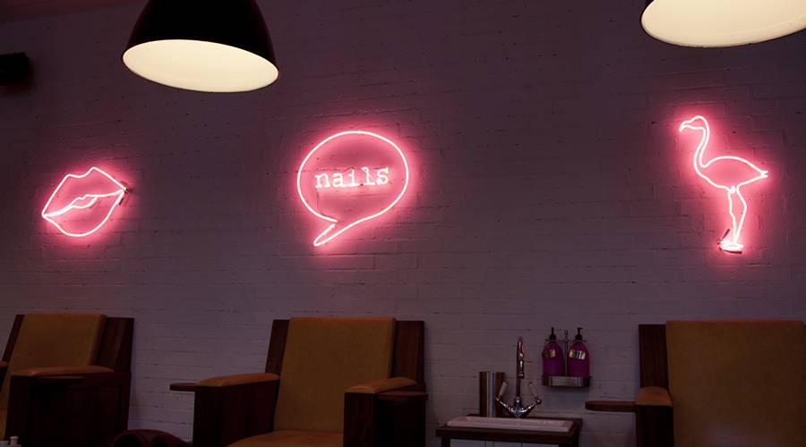 neon mounted directly to brick wall