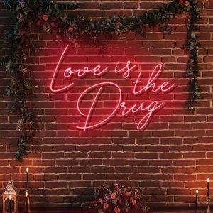 love is the drug neon sign
