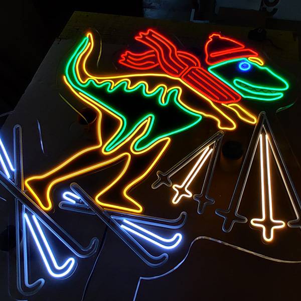 Coach dinosaur christmas window neon signage