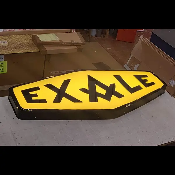 Exale closeup building sign