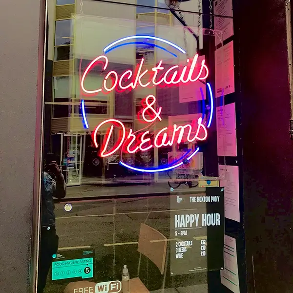 cocktails and dreams neon bar sign