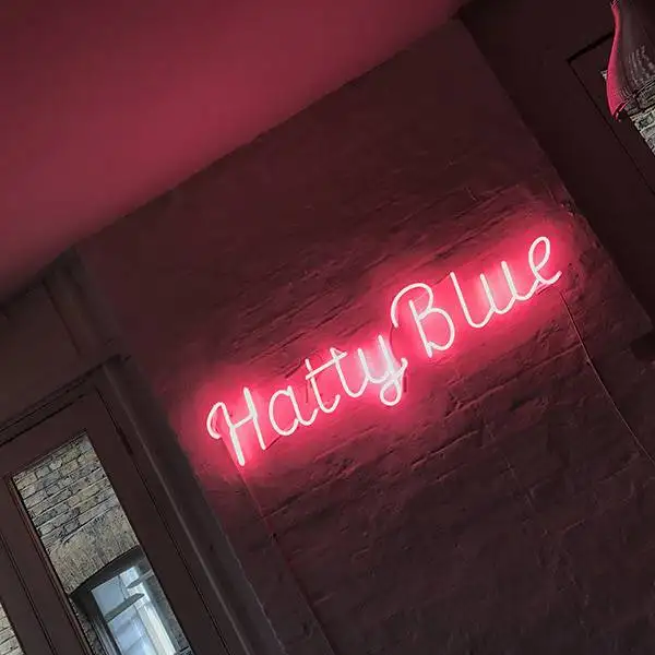 hatty blue neon sign