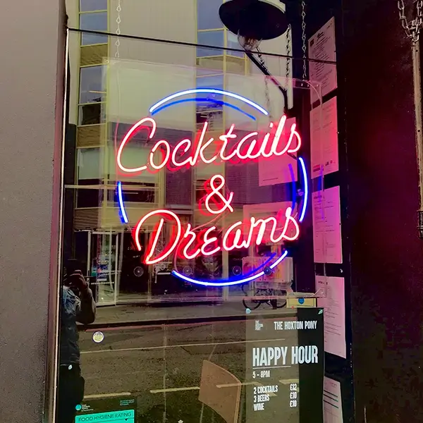 real glass neon cocktails and dreams sign