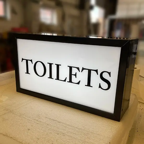 Toilets lightbox sign