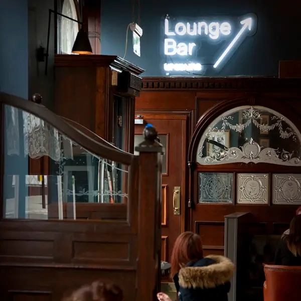 lounge bar upstairs neon ultra sign