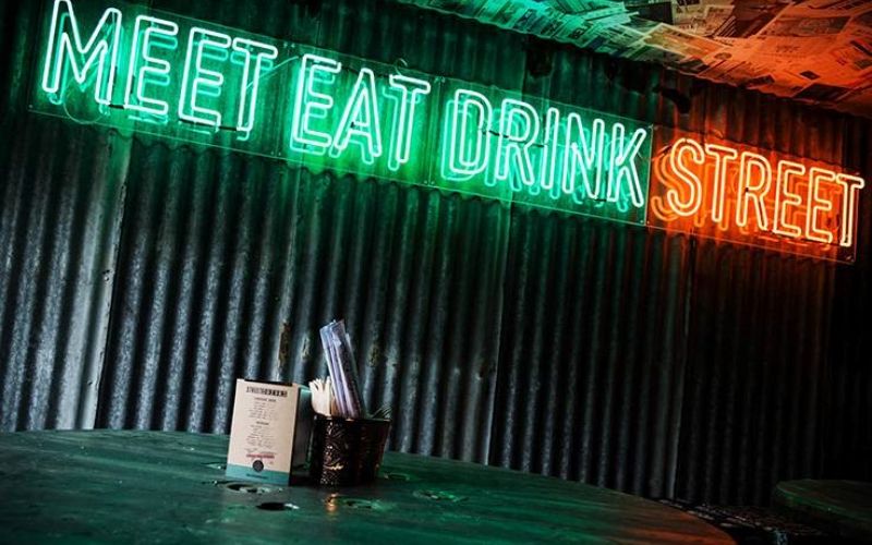 outdoor-neon-signs-eat-drink-street-min
