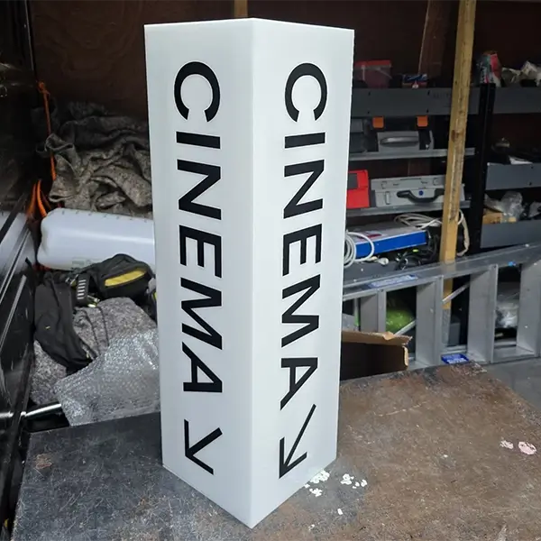 white cinema lightbox sign